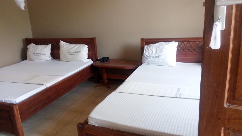 Mara Courtyard Lodge Dar es Salaam Extérieur photo
